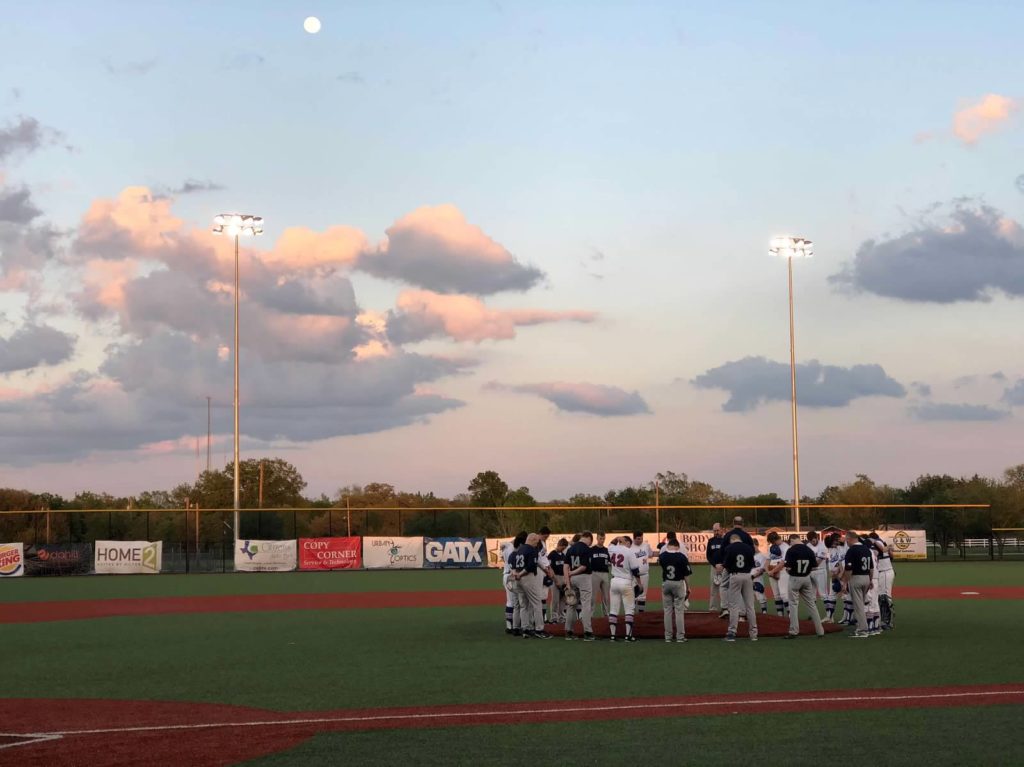 Knights baseball team at mound